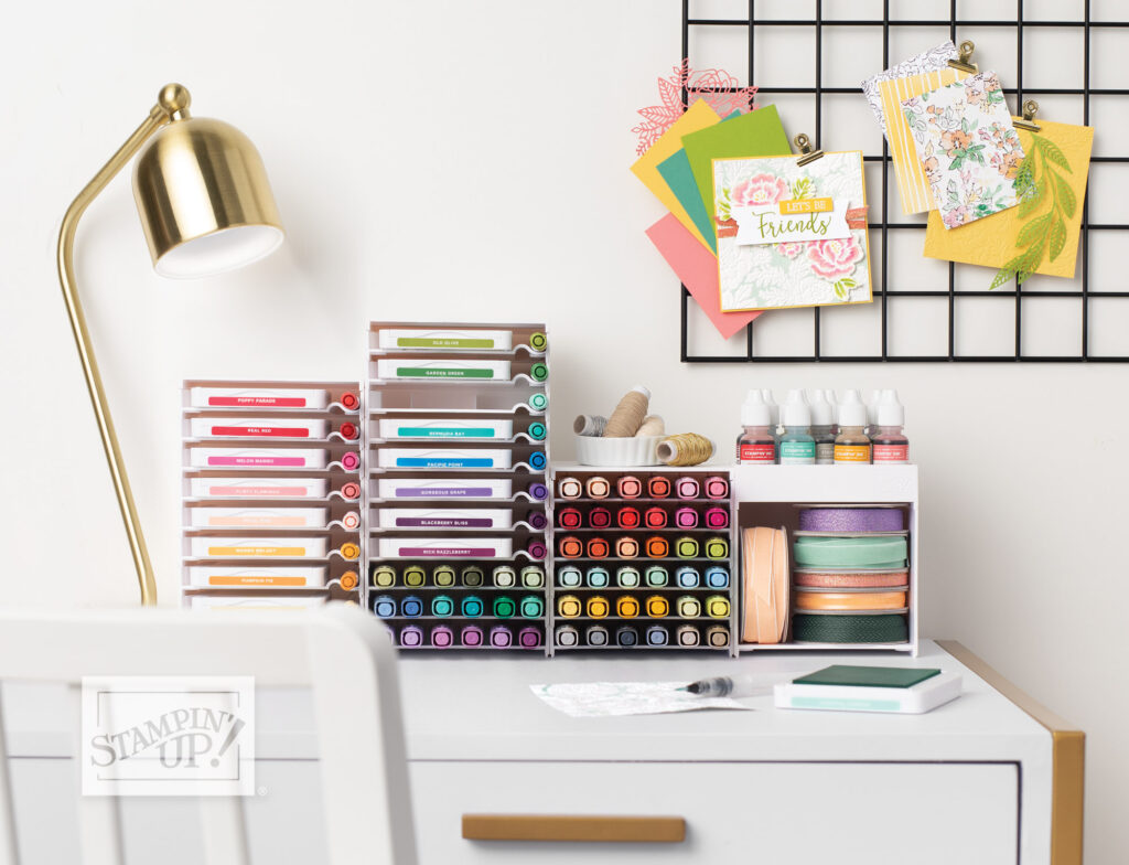 picture showing a very organised desk with Ink pads, ribbons and blend pens.