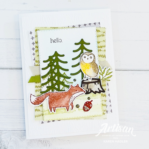 A greeting Card with an Owl and a fox in the forest. the sentiment reads Hello