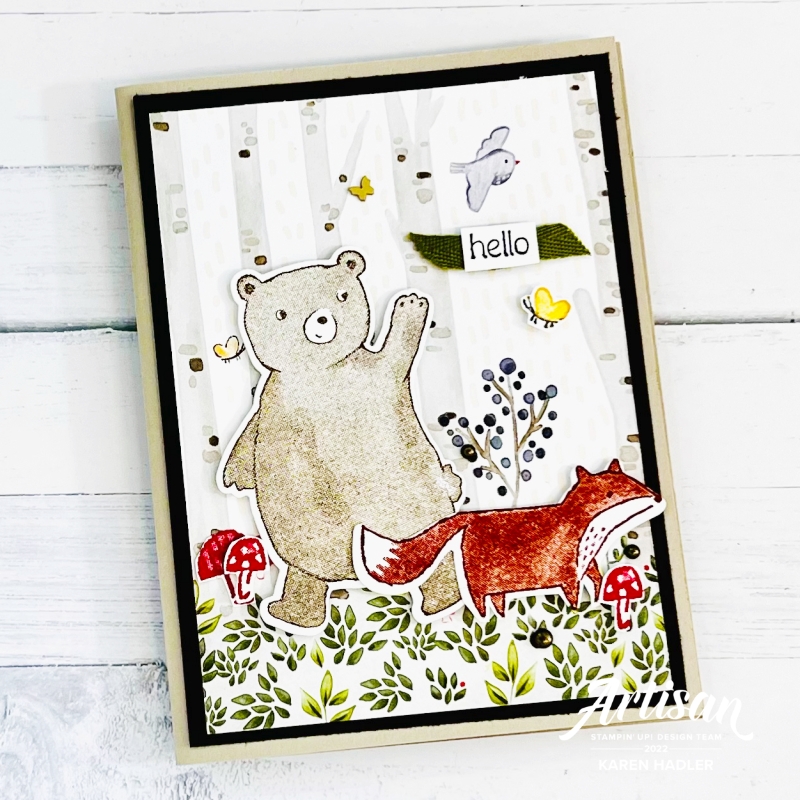 A picture of a greeting card with a bear and fox Hello