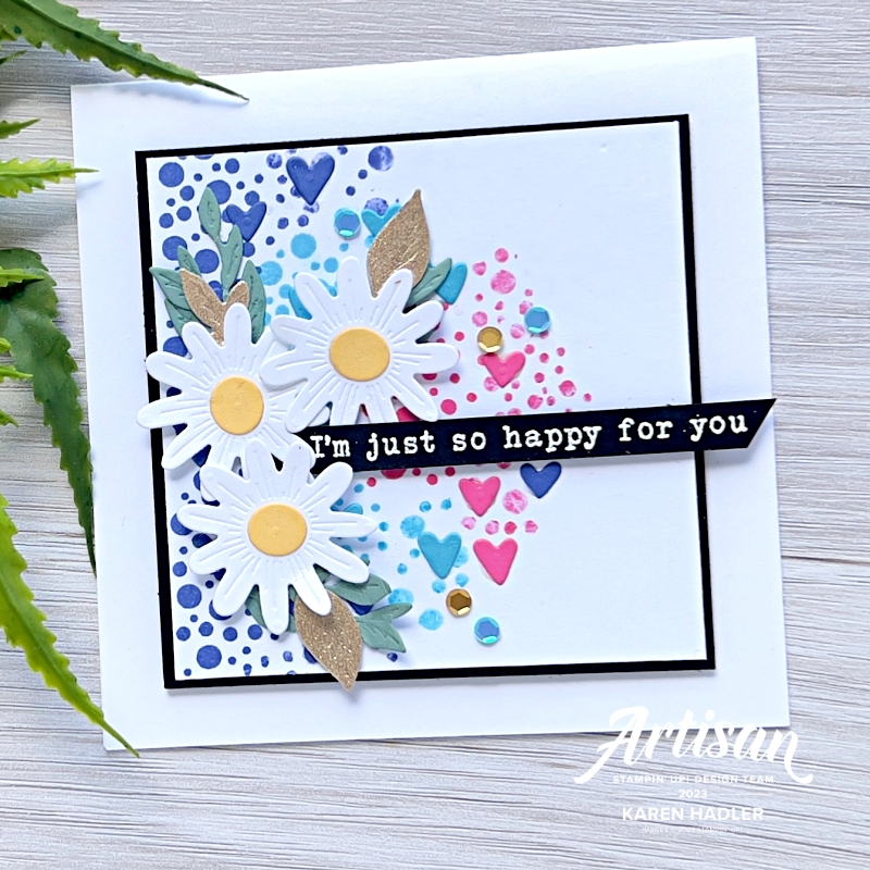 A picture of a bright and happy card with bright colours in the background and 3 happy daisies. The sentiment reads I'm just so happy for you