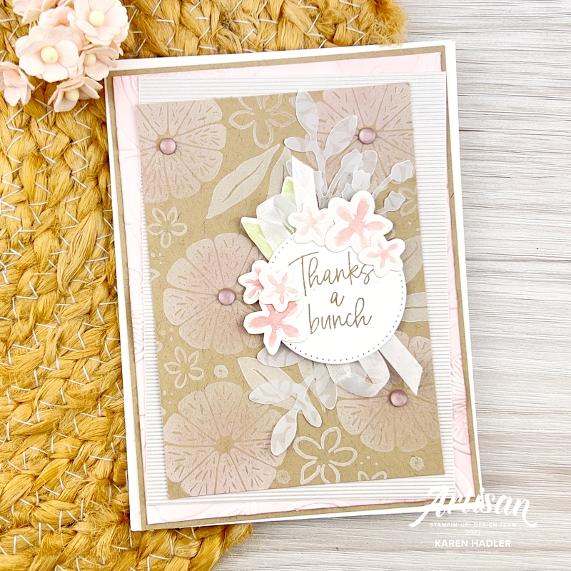 A greeting card with Basic White, Crumb Cake and pink. The inside of a lemon is stamped in. white to look like a flower. The is a circle with a sentiment reading Thanks a Bunch. 