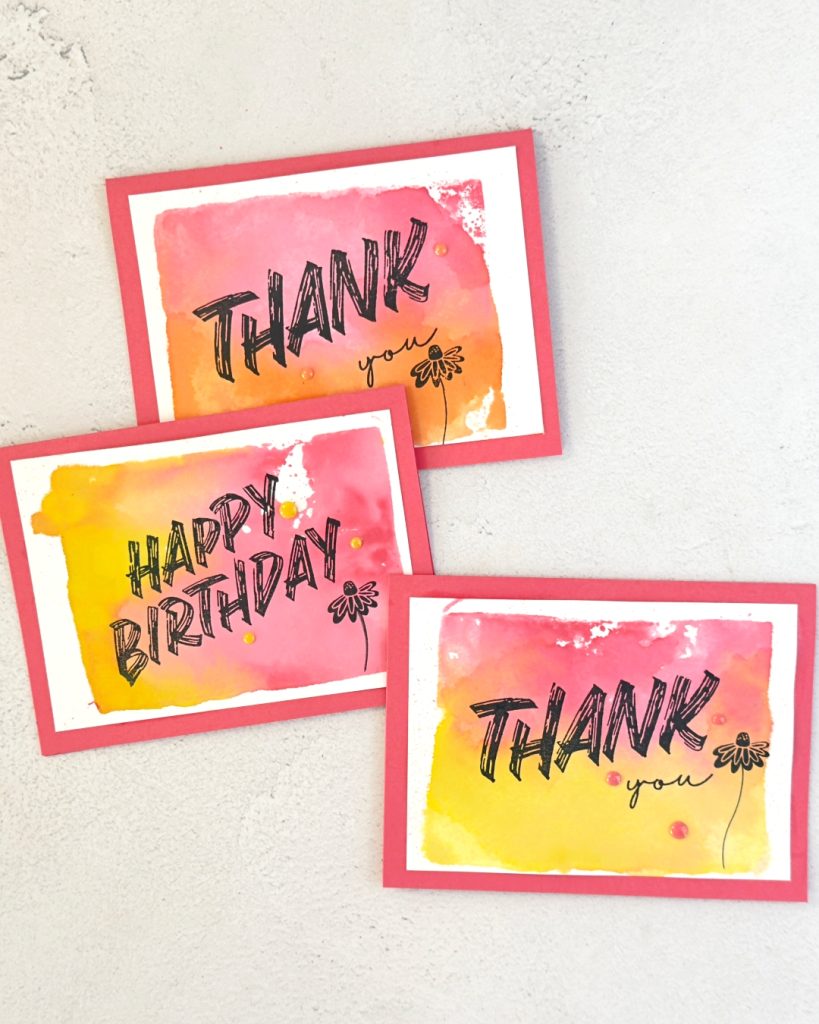 3 cards on a Strawberry Slush card base. On the front of each is a watercoloured background of either Strawberry Slush and Timid Tiger or Strawberry Slush and Darling Duckling. The sentiment is large bold lettering of Thank You or Happy Birthday.