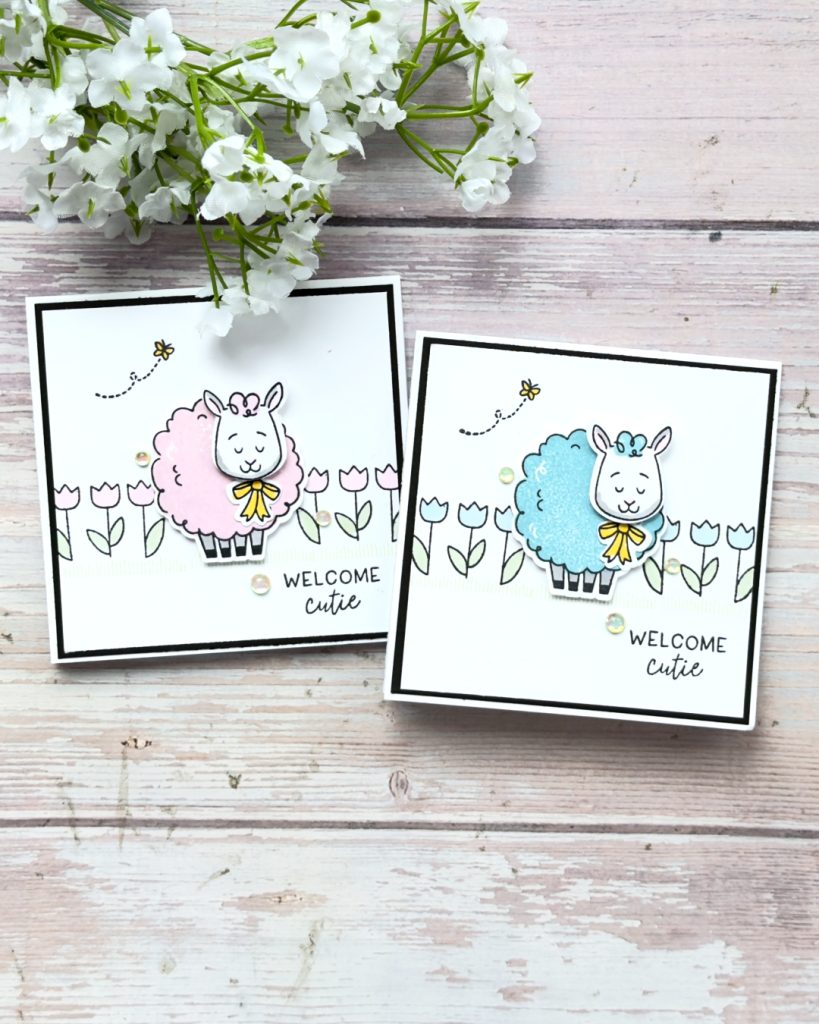 Pair of handmade baby cards using the Stampin’ Up Woolly Friends stamp set, showing a pink sheep and a blue sheep with yellow bows, simple tulip line art backgrounds, soft ink blending, and the sentiment “Welcome Cutie.”