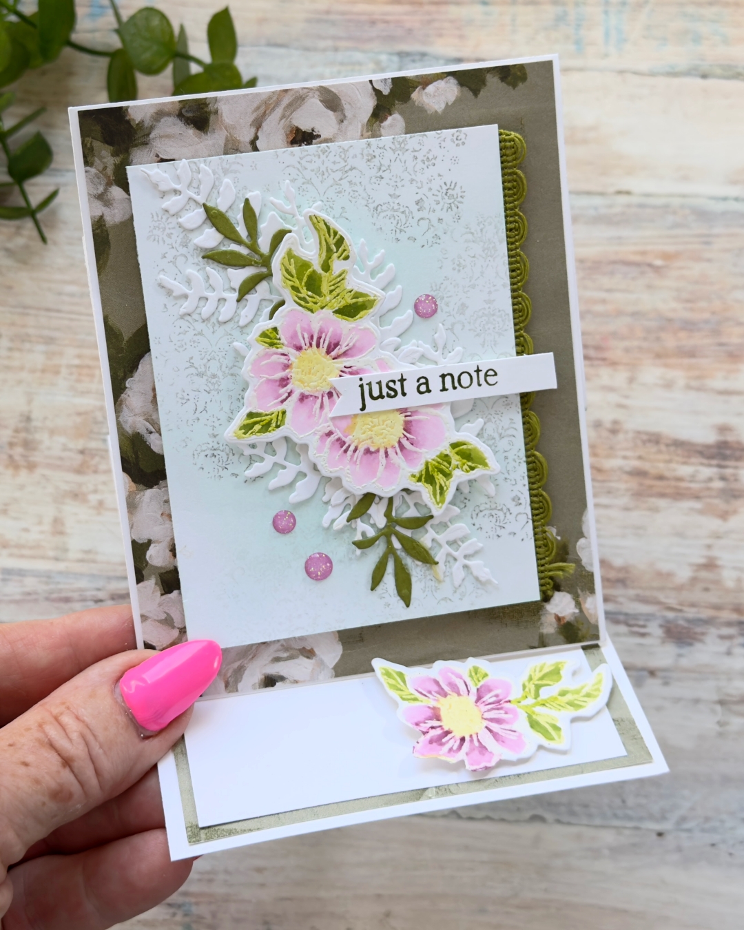 Handmade floral easel card using the Beautiful Gallery Suite, featuring pink embossed flowers, layered die cuts, ribbon detail and a “just a note” sentiment.